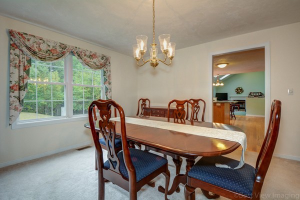 5 Garrison Road Shirley, MA 01464 - Photo 5 of 29 a view of a dining room with furniture window and outside view