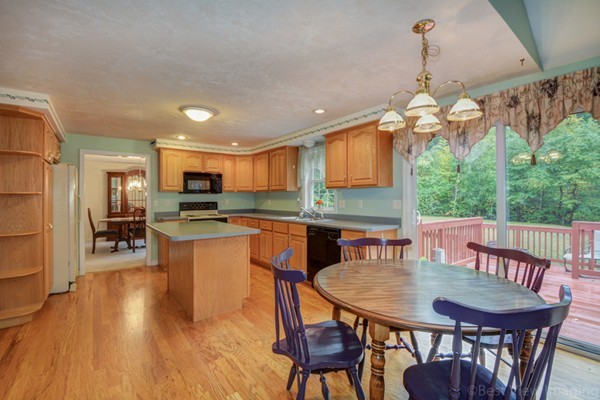 5 Garrison Road Shirley, MA 01464 - Photo 7 of 29 a view of a dining room with furniture window and wooden floor