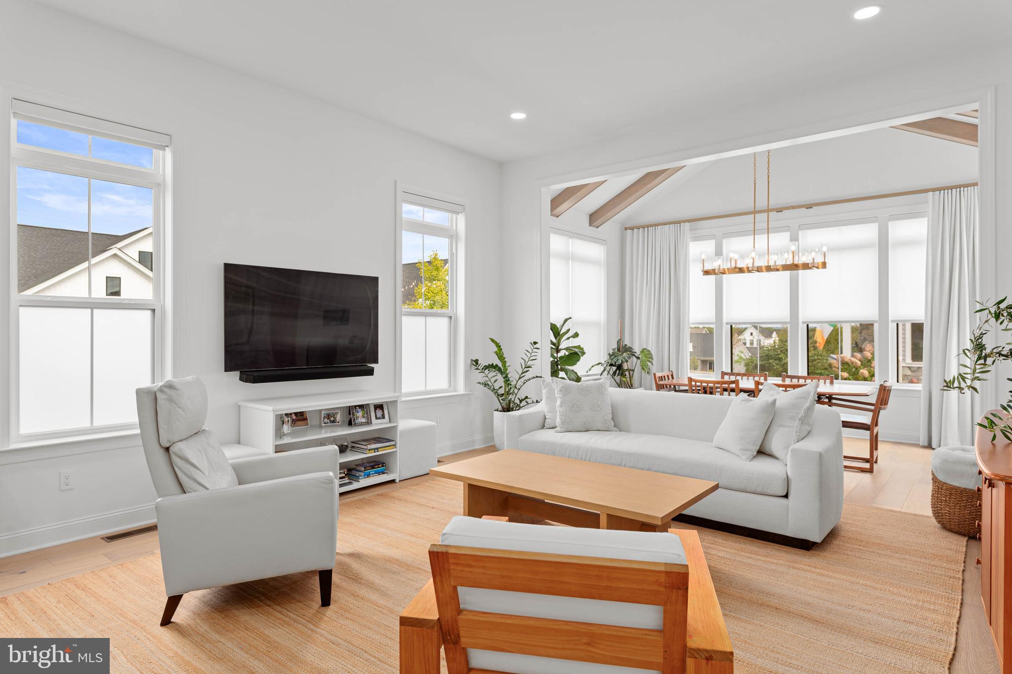 142 Preakness Way Downingtown, PA 19335 - Photo 12 of 56 a living room with furniture and a flat screen tv