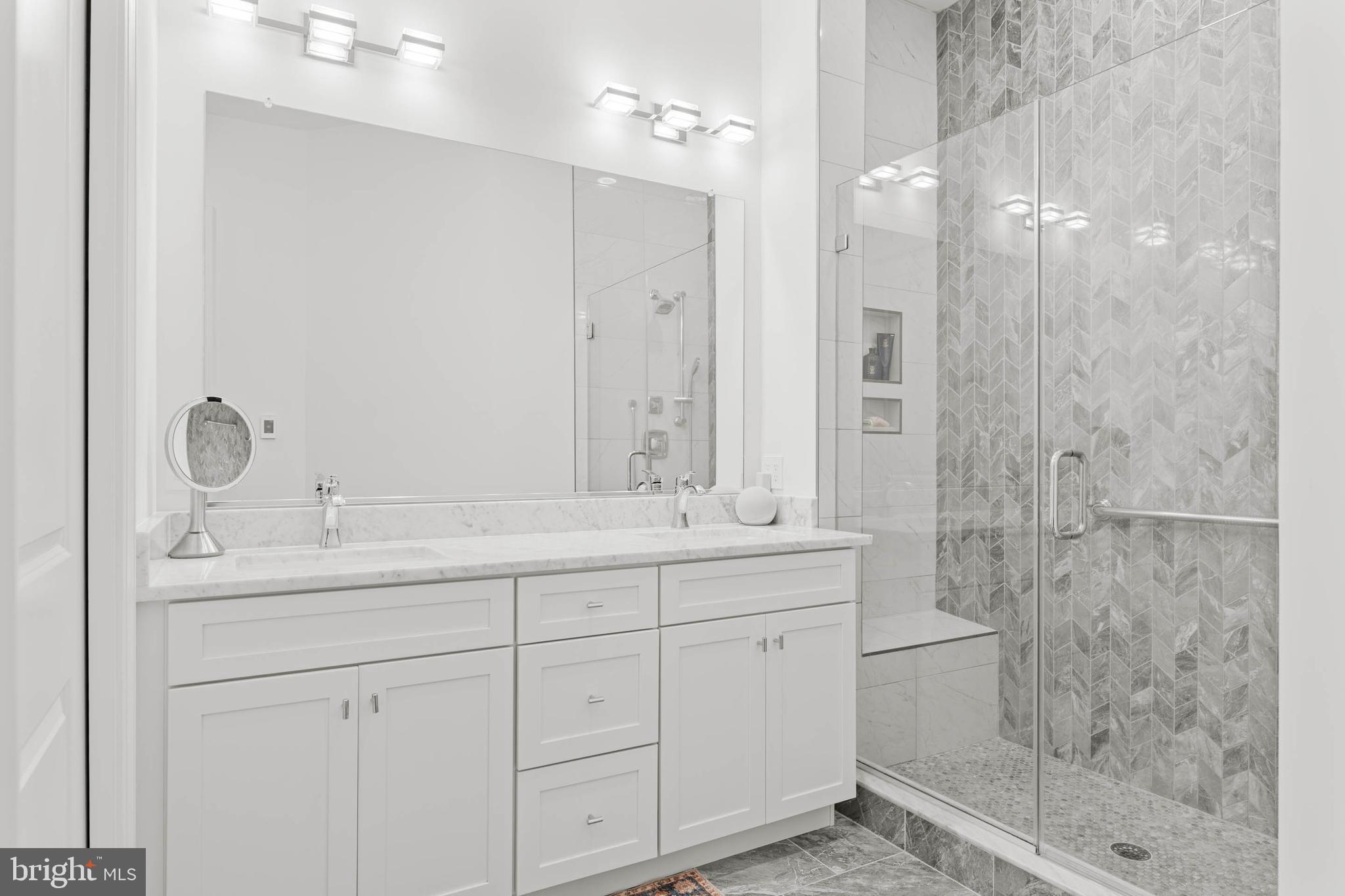 142 Preakness Way Downingtown, PA 19335 - Photo 23 of 56 a bathroom with a double vanity sink mirror and shower