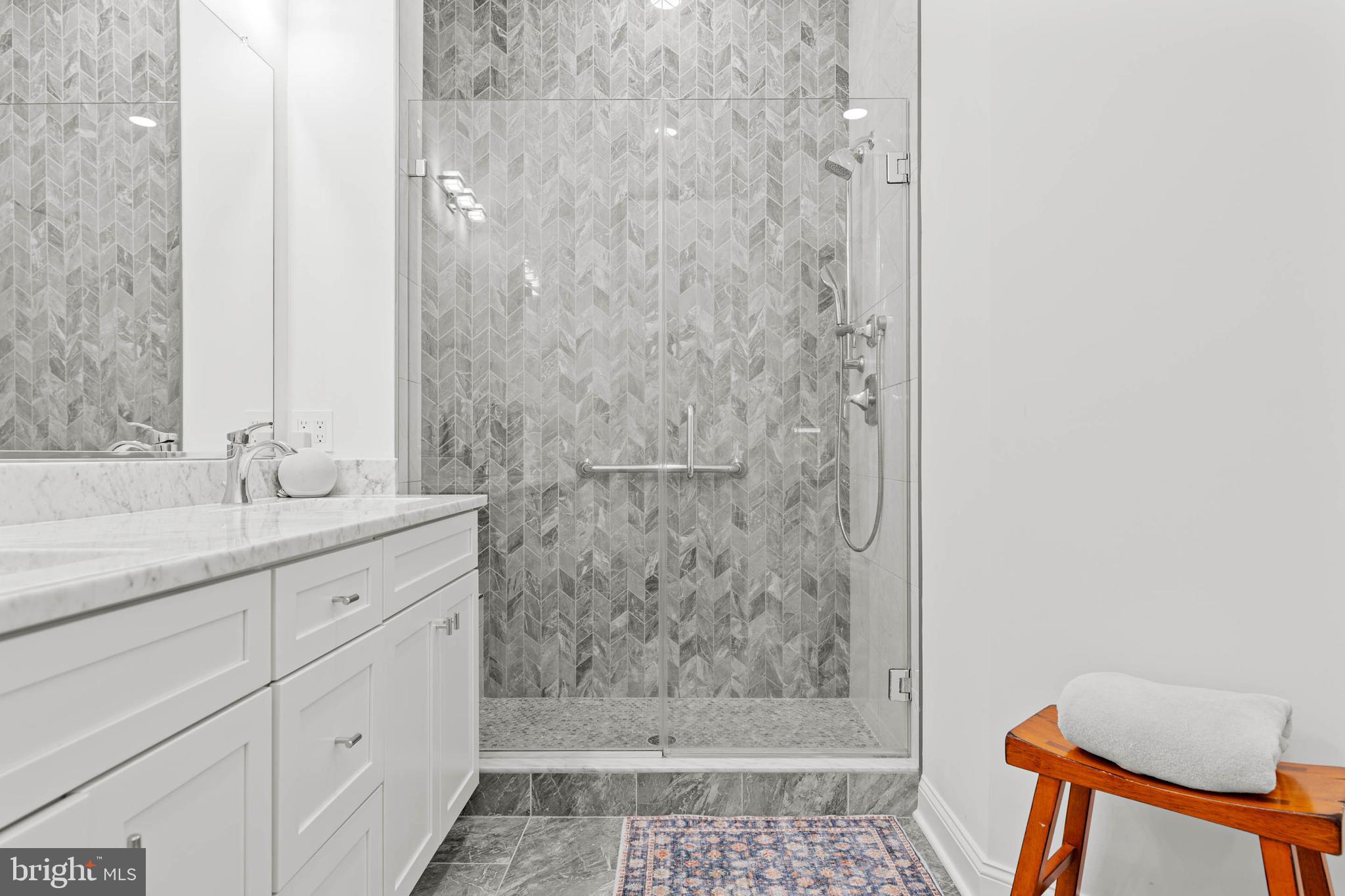 142 Preakness Way Downingtown, PA 19335 - Photo 24 of 56 a bathroom with a sink and a mirror