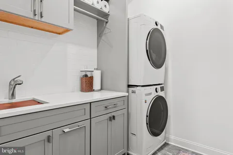 a view of a room with stairs and a window