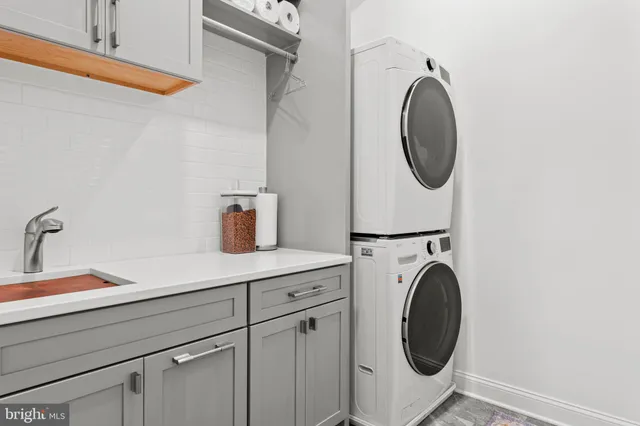 a view of a room with stairs and a window