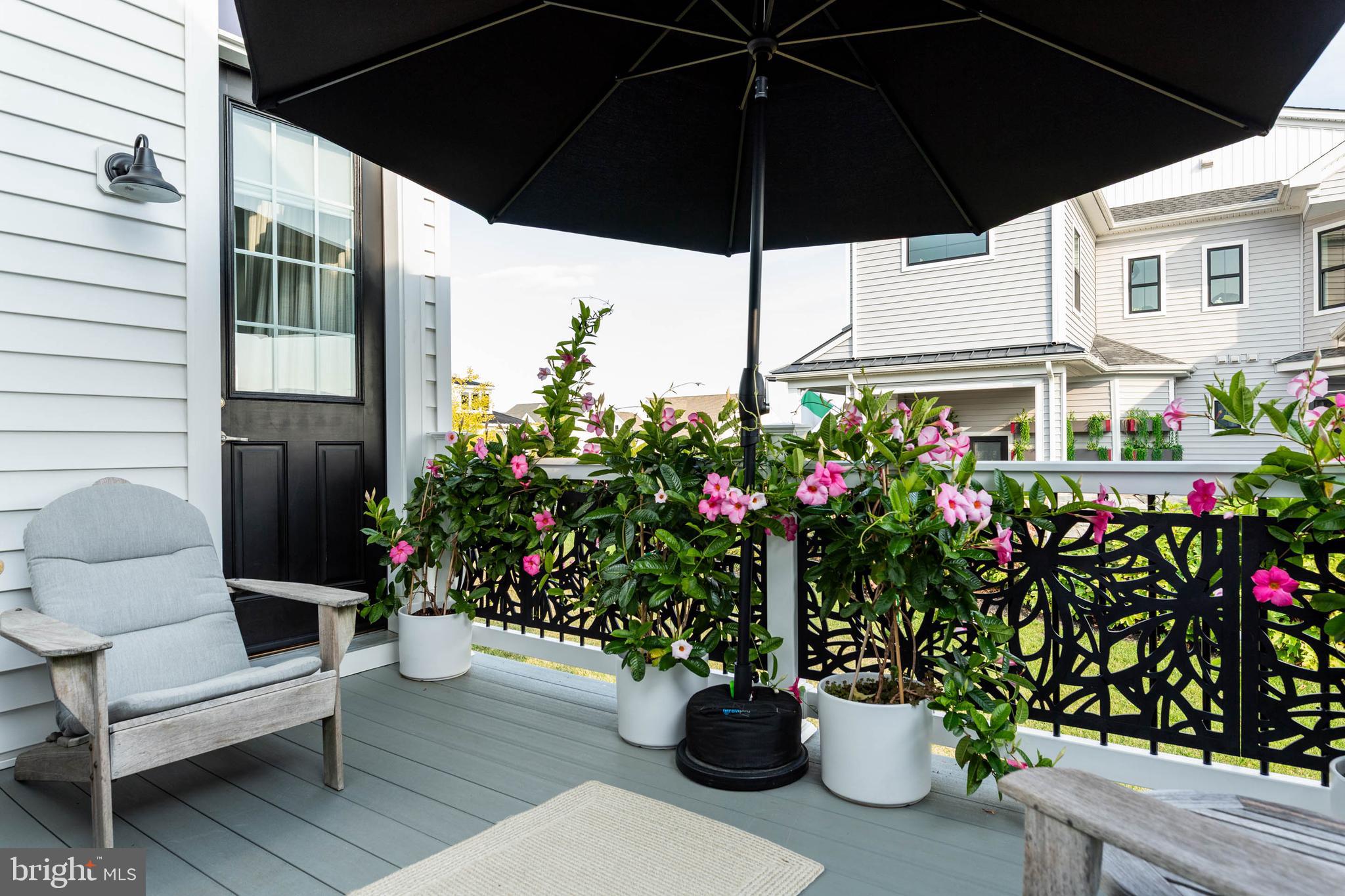 142 Preakness Way Downingtown, PA 19335 - Photo 40 of 56 a view of a chair and table in the patio with a potted plant