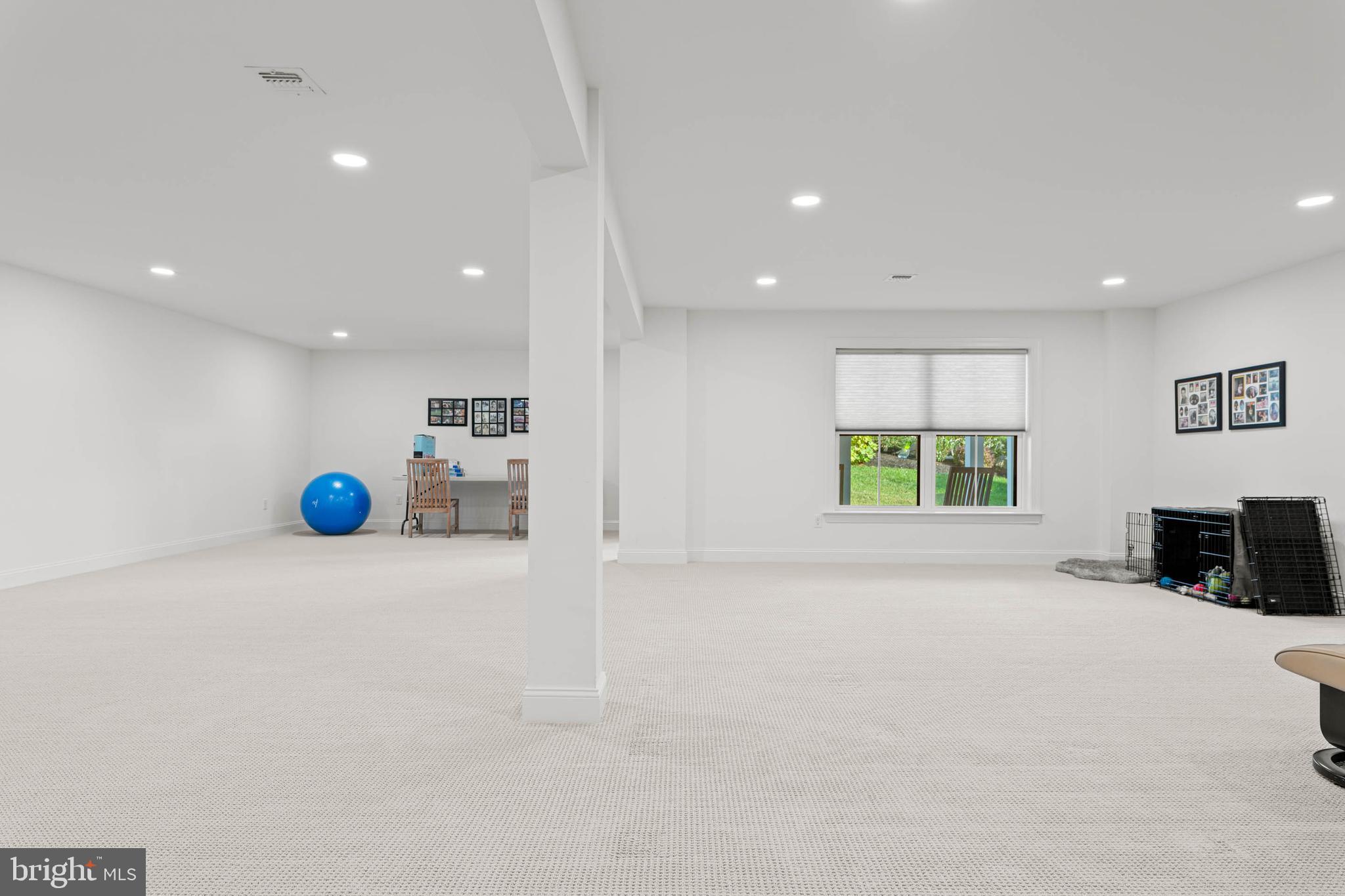 142 Preakness Way Downingtown, PA 19335 - Photo 41 of 56 a view of an empty room with a window and a couch