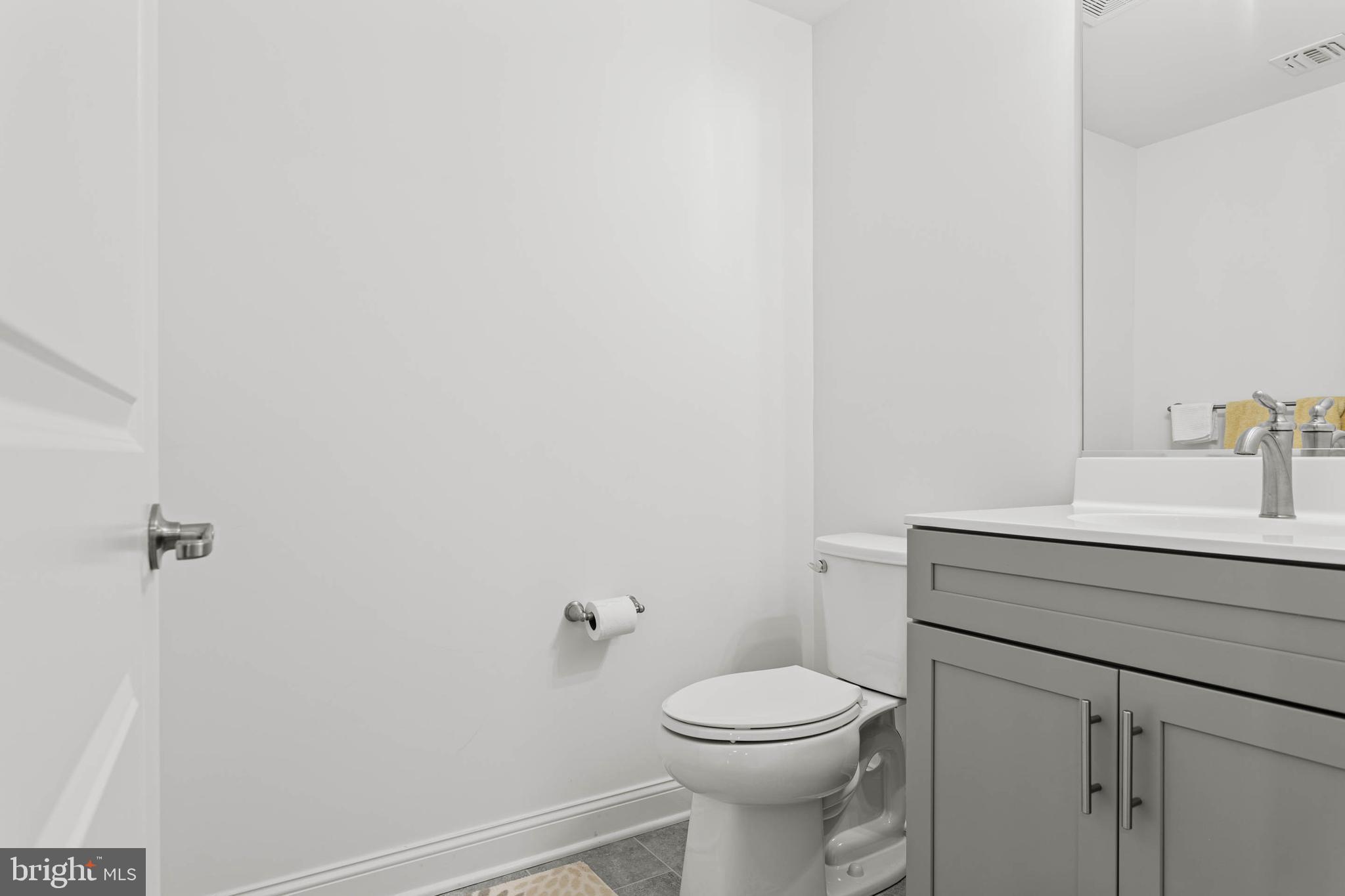 142 Preakness Way Downingtown, PA 19335 - Photo 43 of 56 a bathroom with a sink a toilet and vanity