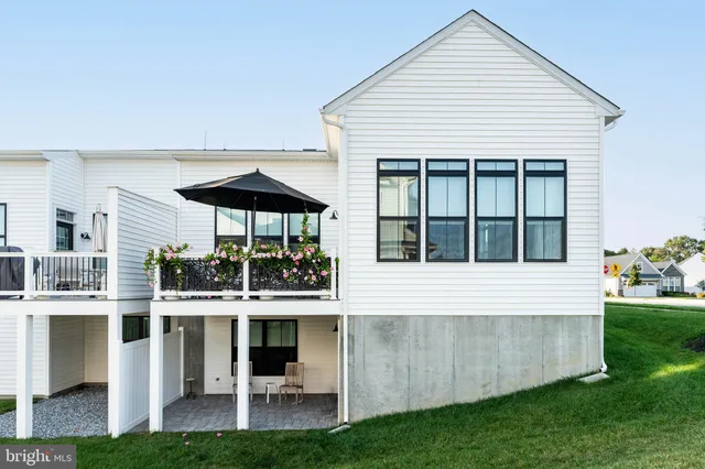 a view of lobby with furniture and floor to ceiling windows