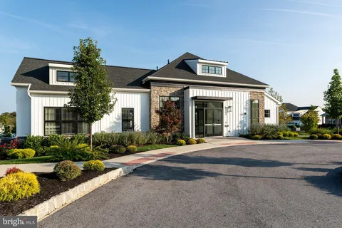 a room with pool table and flat screen tv