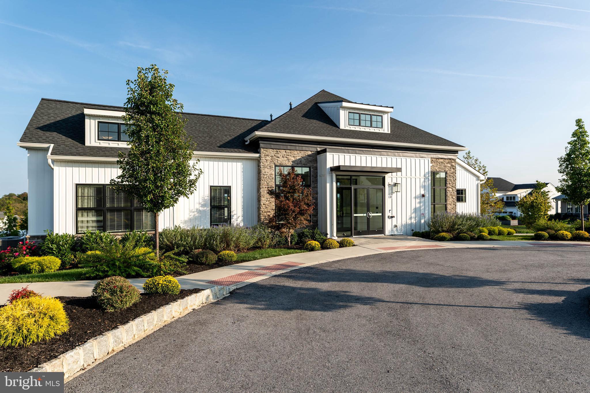 142 Preakness Way Downingtown, PA 19335 - Photo 46 of 56 a front view of a house with garden