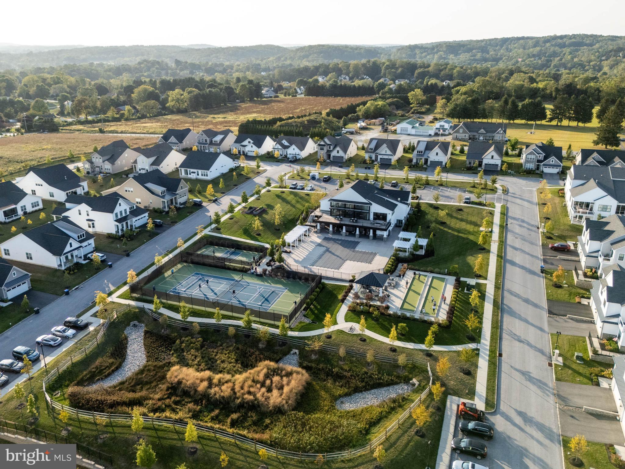142 Preakness Way Downingtown, PA 19335 - Photo 55 of 56 a view of a lake with a mountain view