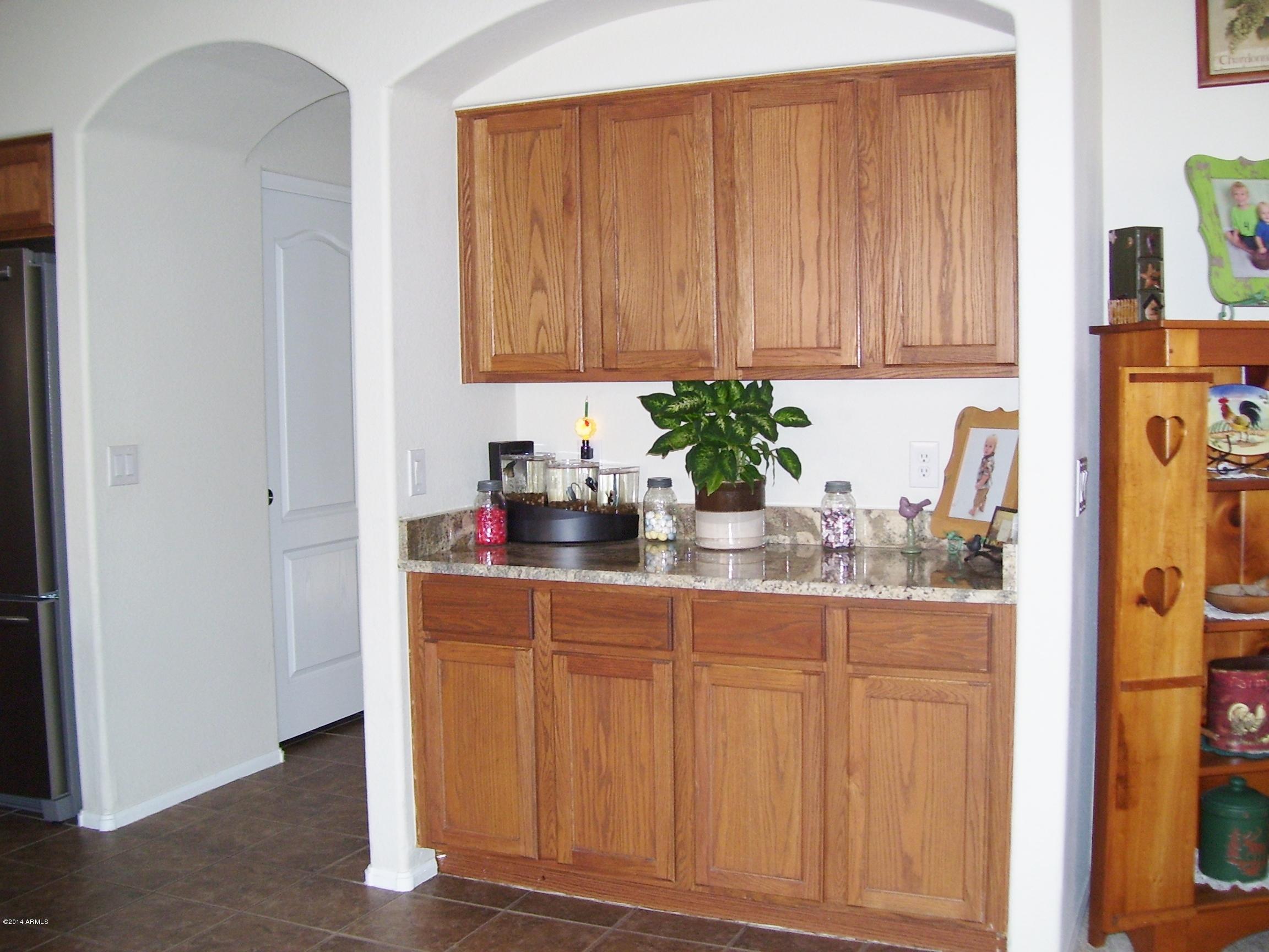 4610 West Beverly Road Laveen, AZ 85339 - Photo 9 of 34 EXTRA STORAGE IN KITCHEN