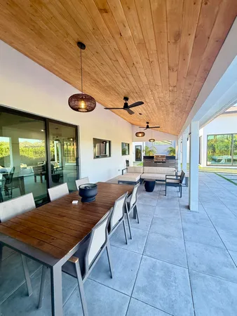 a kitchen with stainless steel appliances granite countertop a stove and a refrigerator