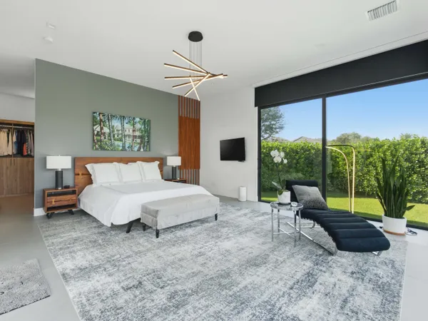 a view of a livingroom with furniture and entryway