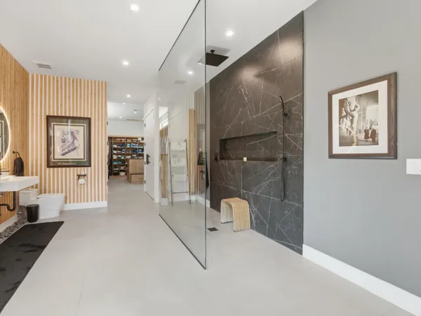 a bathroom with a bathtub and toilet