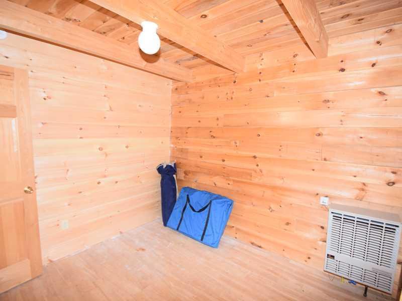 750 Dwinal Pond Road Winn, ME 04495 - Photo 9 of 18 Bedroom. First level bedroom with...