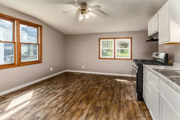 a view of entryway with wooden floor