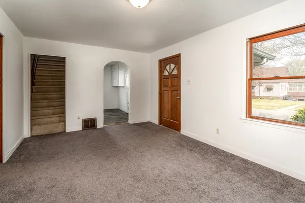 an empty room with windows