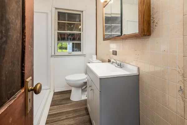 a bathroom with a sink and a toilet