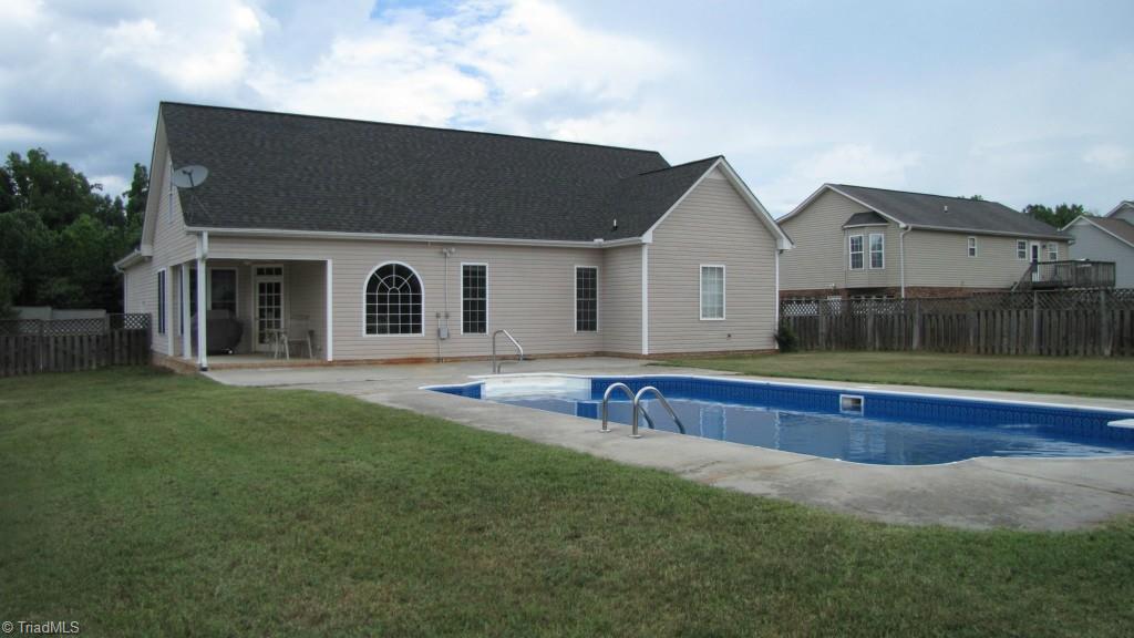 145 Sunset Ridge Lane Lexington, NC 27295 - Photo 22 of 22 Exterior Back with fenced yard and swimming pool