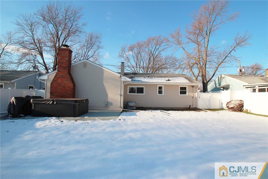 13 Racetrack Road East Brunswick, NJ 08816 - Photo 14 of 15 a view of a house with a yard