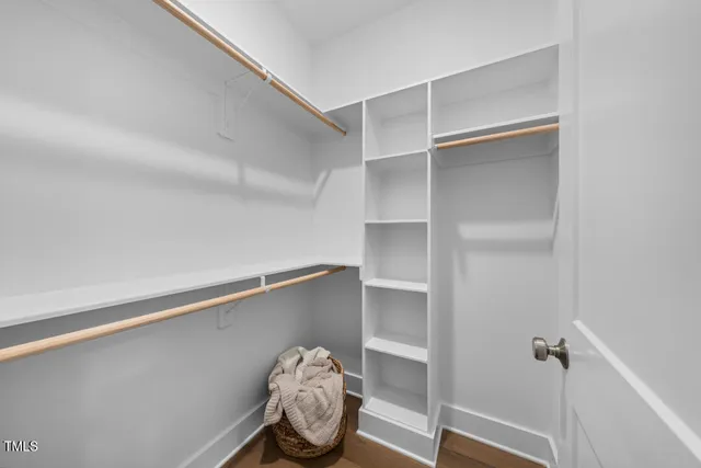 a view of room with racks on the wall