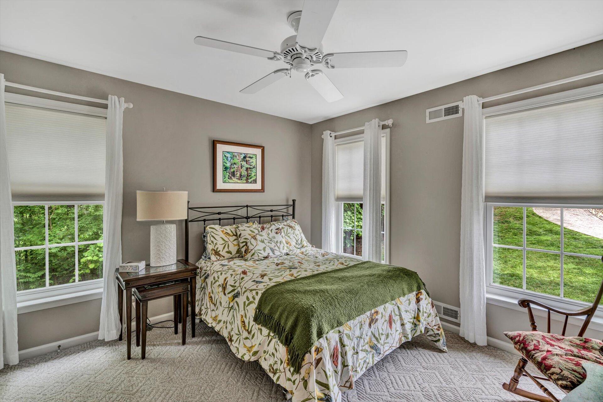 155 Cedar Bay Road Union Hall, VA 24176 - Photo 23 of 61 a bedroom with a bed and a window