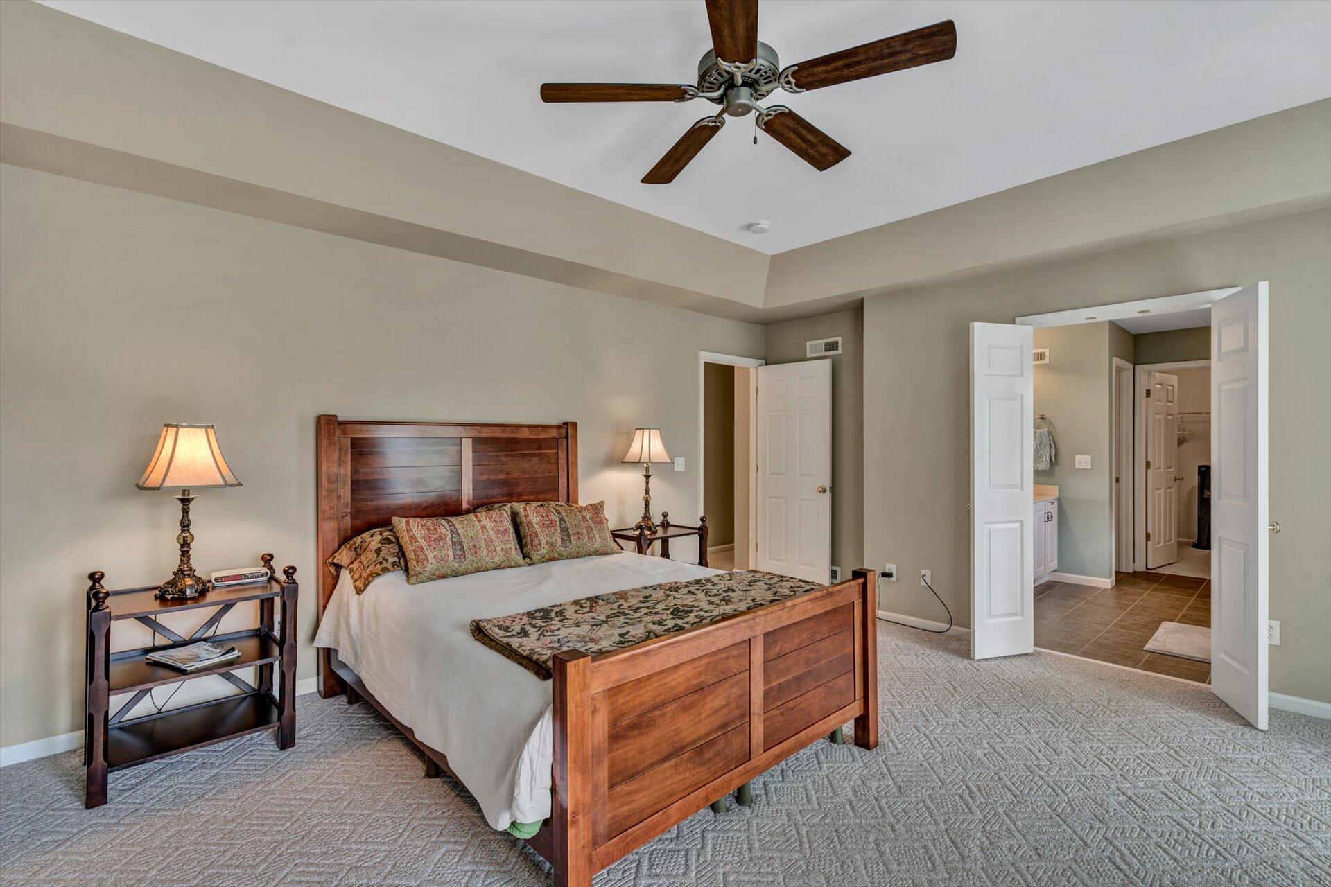 155 Cedar Bay Road Union Hall, VA 24176 - Photo 25 of 61 a bedroom with a bed and a lamp