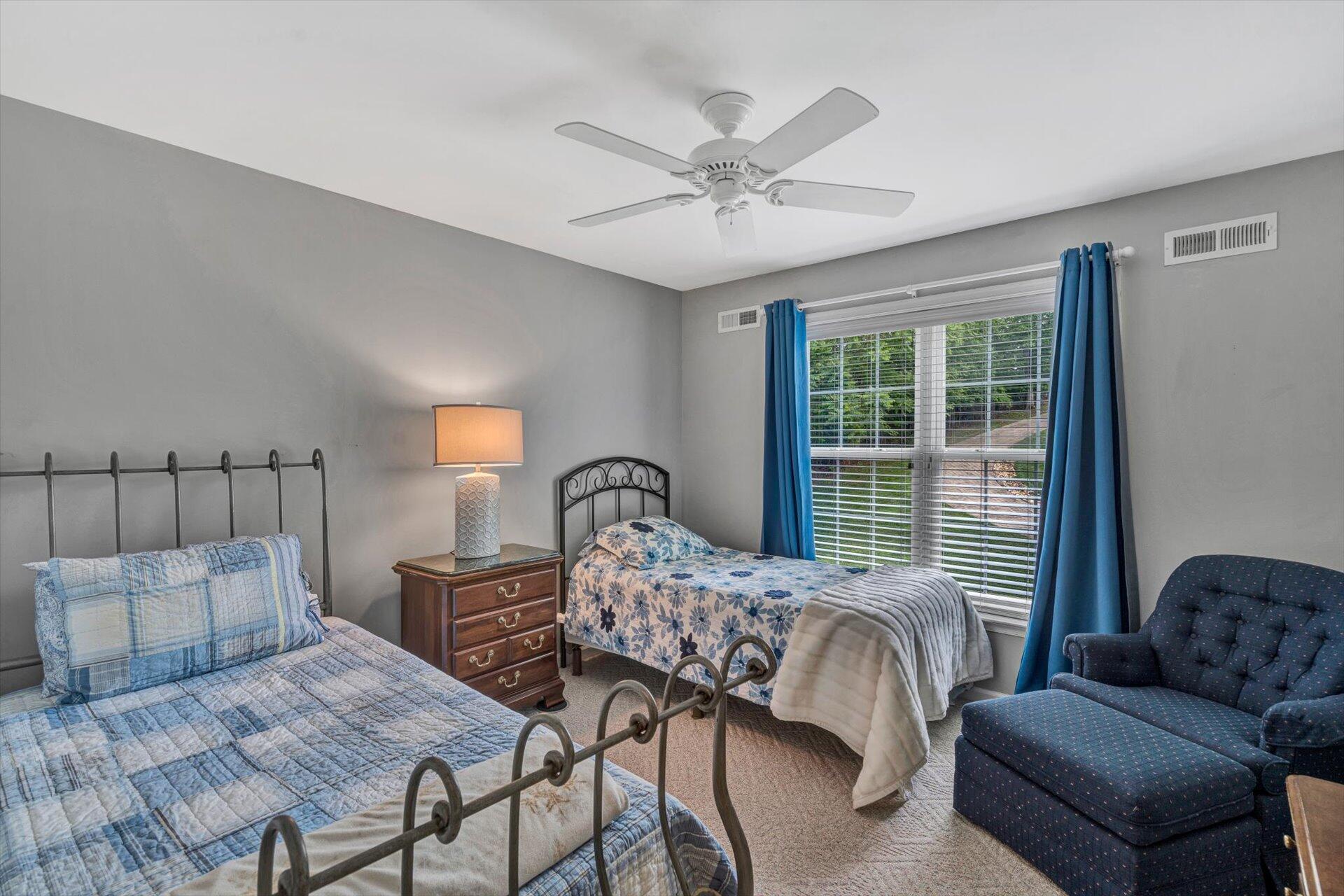 155 Cedar Bay Road Union Hall, VA 24176 - Photo 30 of 61 a bedroom with a bed and a couch