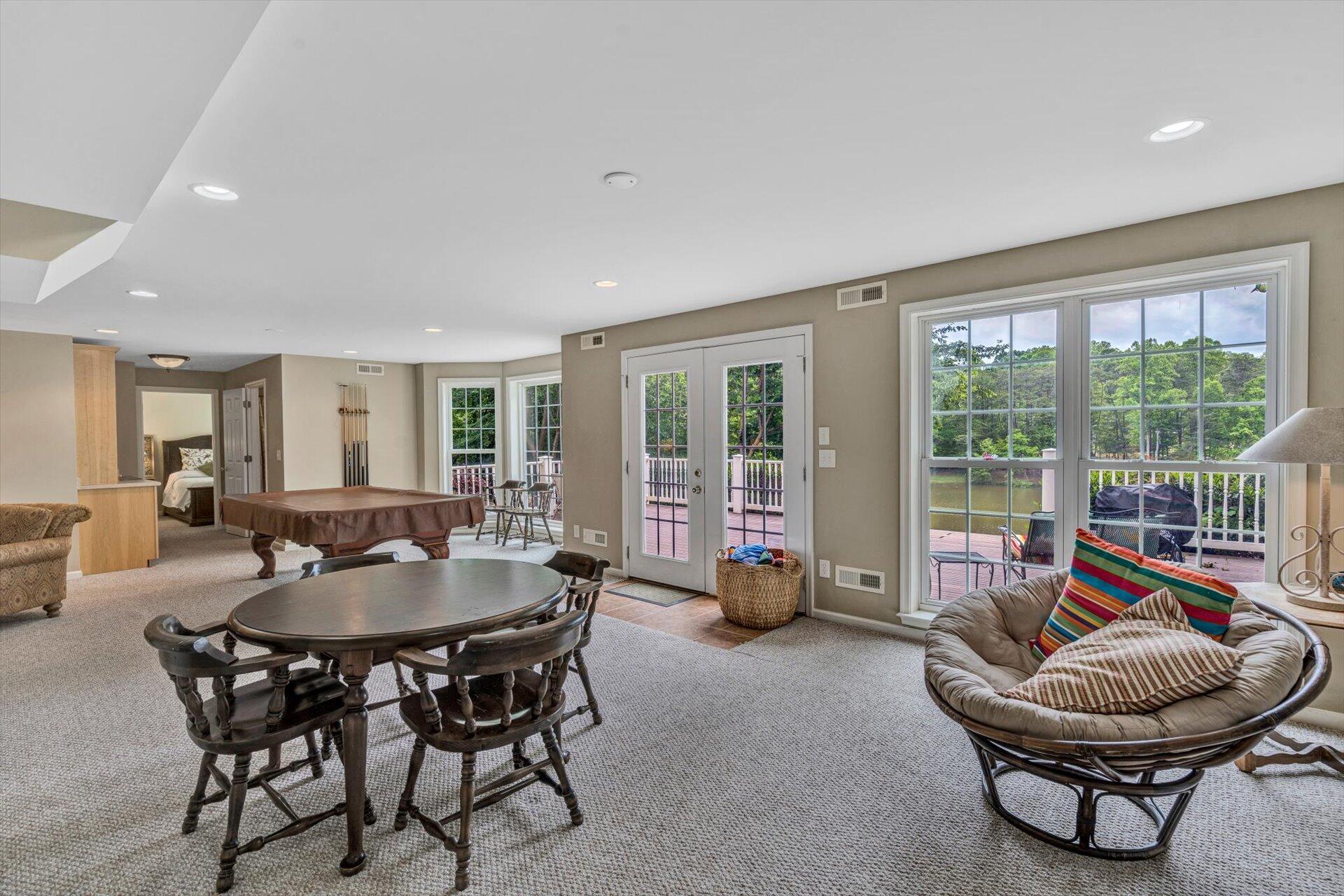 155 Cedar Bay Road Union Hall, VA 24176 - Photo 35 of 61 a living room with furniture and a large window