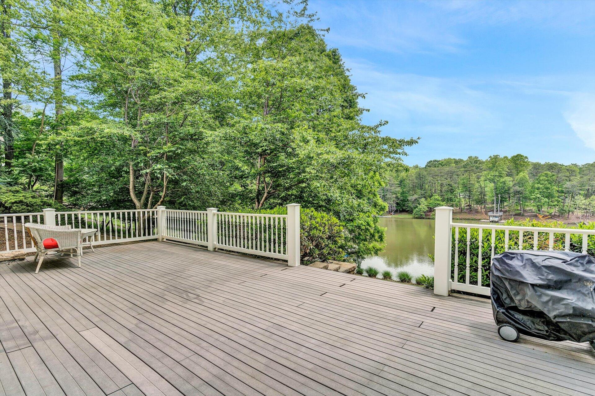 155 Cedar Bay Road Union Hall, VA 24176 - Photo 43 of 61 a view of a deck with chair and wooden floor