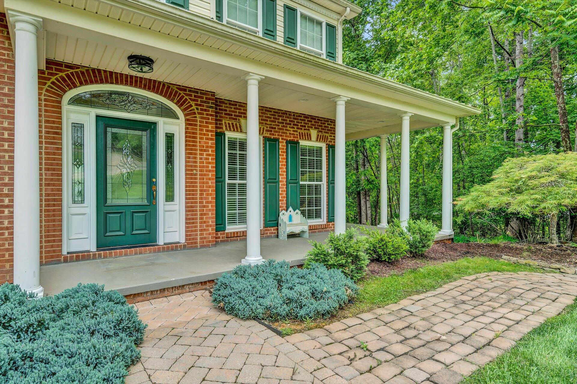 155 Cedar Bay Road Union Hall, VA 24176 - Photo 7 of 61 a front view of a house with garden