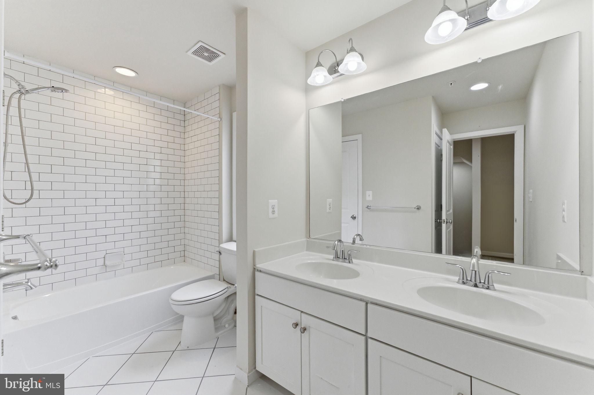 169 Kandinsky Loop Silver Spring, MD 20906 - Photo 38 of 67 Sleek modern bathroom with elegance.