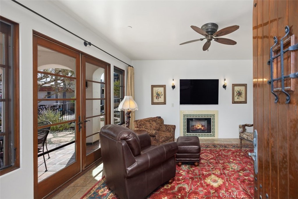 240 Avenida Rosa, Unit B San Clemente, CA 92672 - Photo 4 of 31 Living room with fireplace.