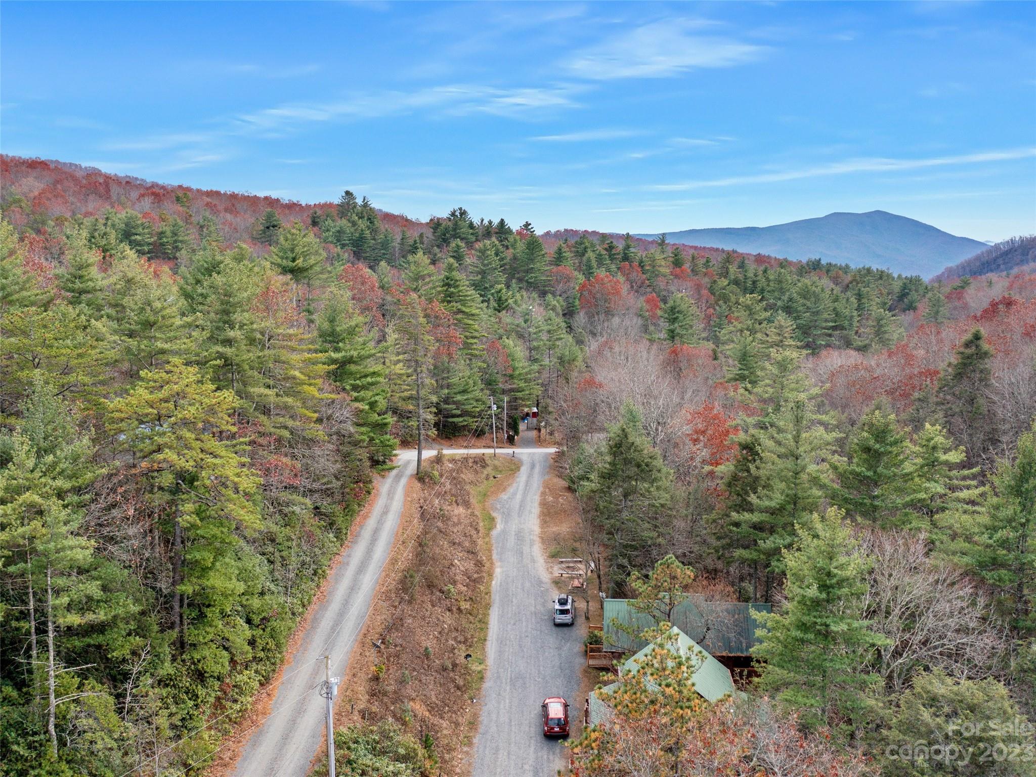 0 Creekside Loop, Unit 15 & 23 Spruce Pine, NC 28777 - Photo 5 of 28 a view of a lake with a mountain in the background