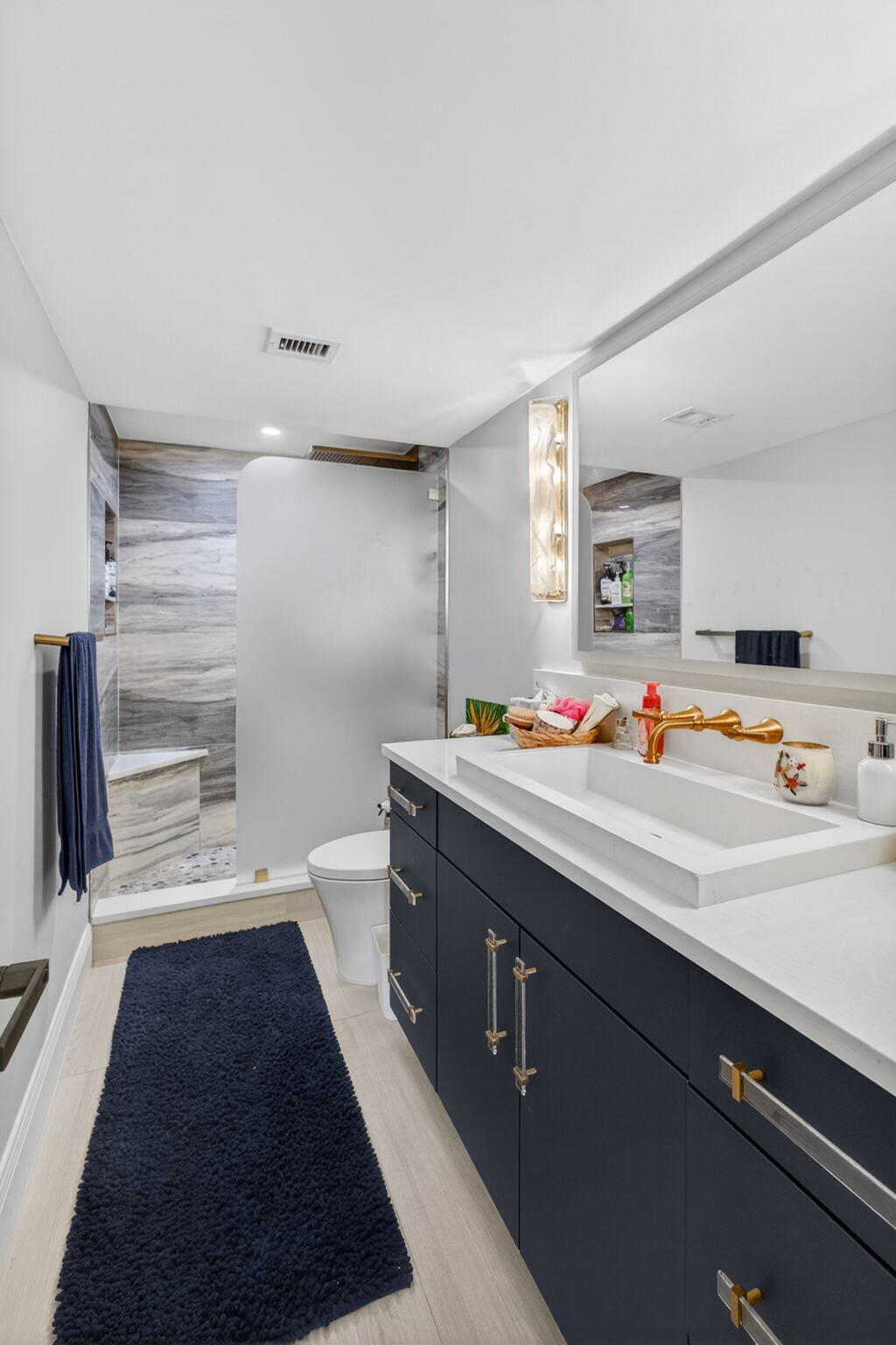 5440 North Ocean Drive, Unit 805 Singer Island, FL 33404 - Photo 14 of 56 a bedroom with a bed and a walk in closet