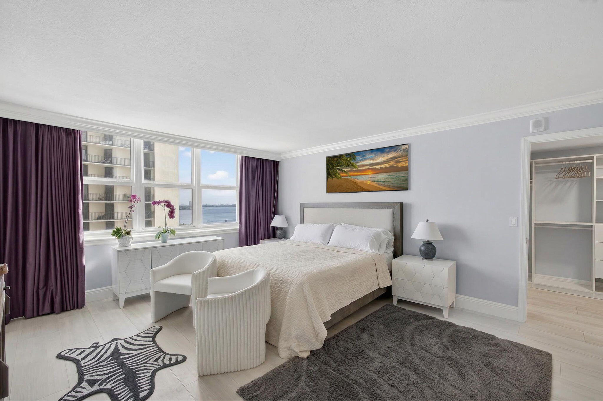 5440 North Ocean Drive, Unit 805 Singer Island, FL 33404 - Photo 16 of 56 a bedroom with a bed and a large window