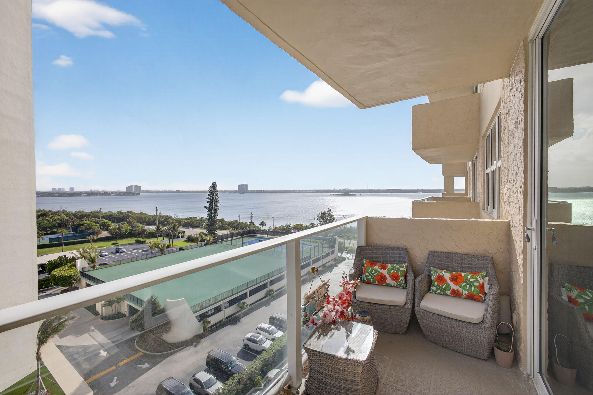 5440 North Ocean Drive, Unit 805 Singer Island, FL 33404 - Photo 22 of 56 a balcony with furniture and city view