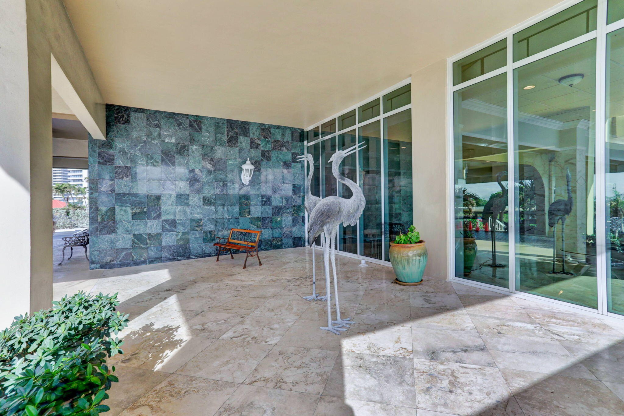 5440 North Ocean Drive, Unit 805 Singer Island, FL 33404 - Photo 28 of 56 a view of steet room with porch and outdoor seating