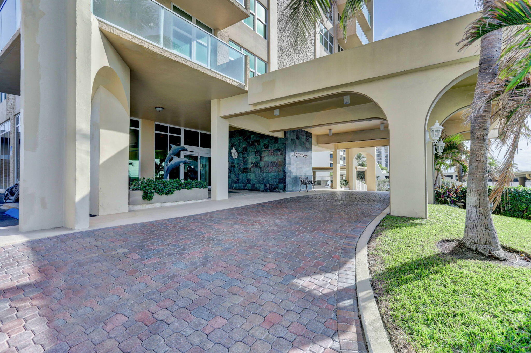 5440 North Ocean Drive, Unit 805 Singer Island, FL 33404 - Photo 30 of 56 a view of a building with a yard