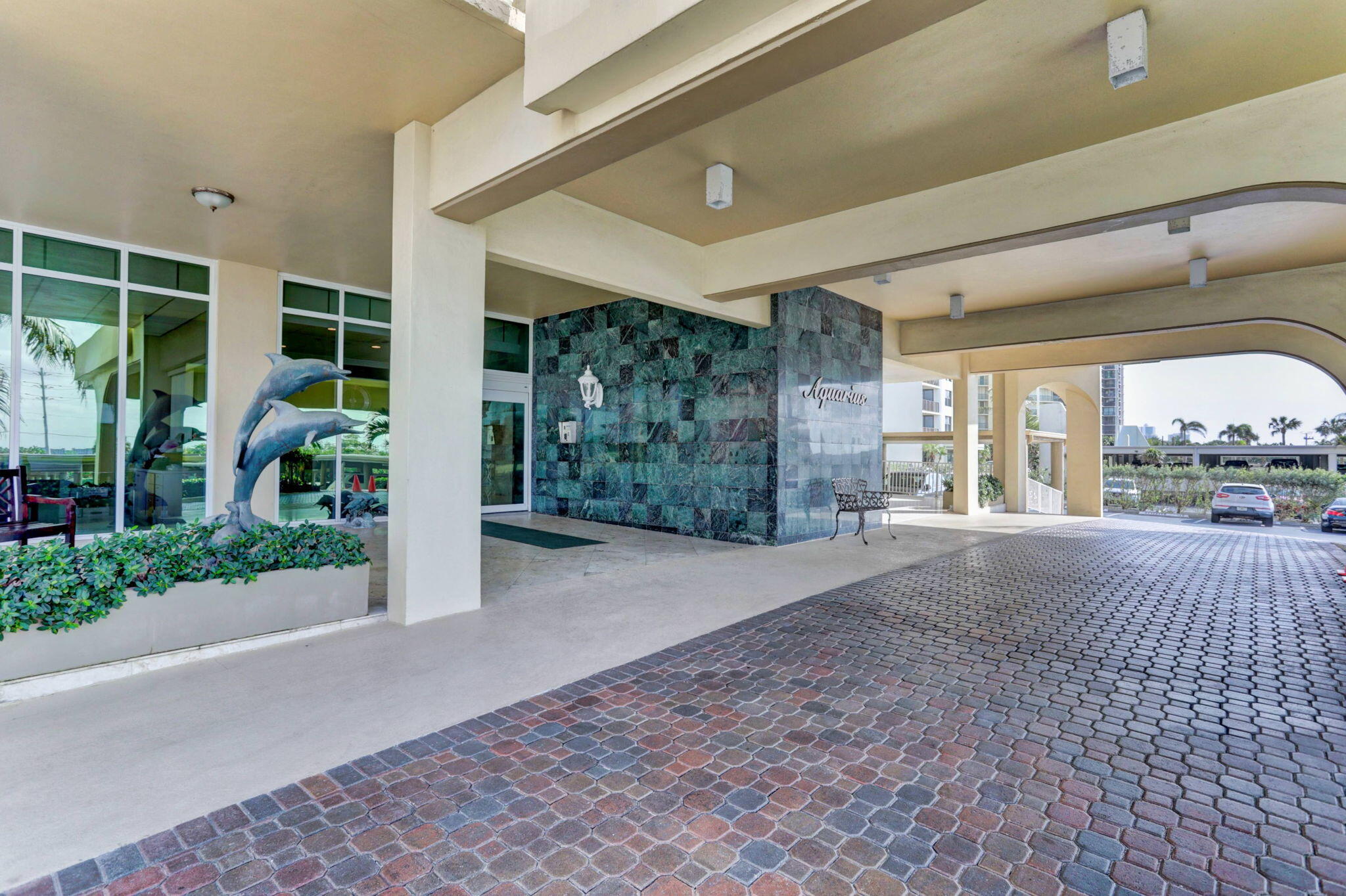 5440 North Ocean Drive, Unit 805 Singer Island, FL 33404 - Photo 31 of 56 a view of a house with porch and garden