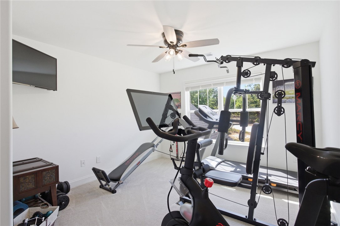 525 16th Circle Walhalla, SC 29691 - Photo 27 of 50 This dedicated fitness space features bright walls and ample natural light, ideal for your home gym setup.