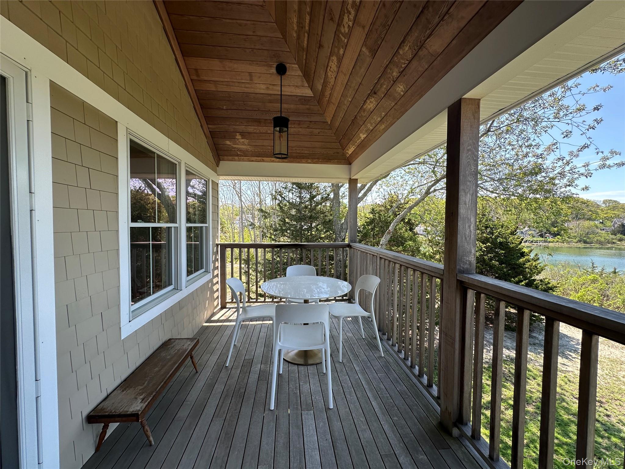 1854 North Bayview Road Southold, NY 11971 - Photo 5 of 20 Wooden terrace featuring a water view