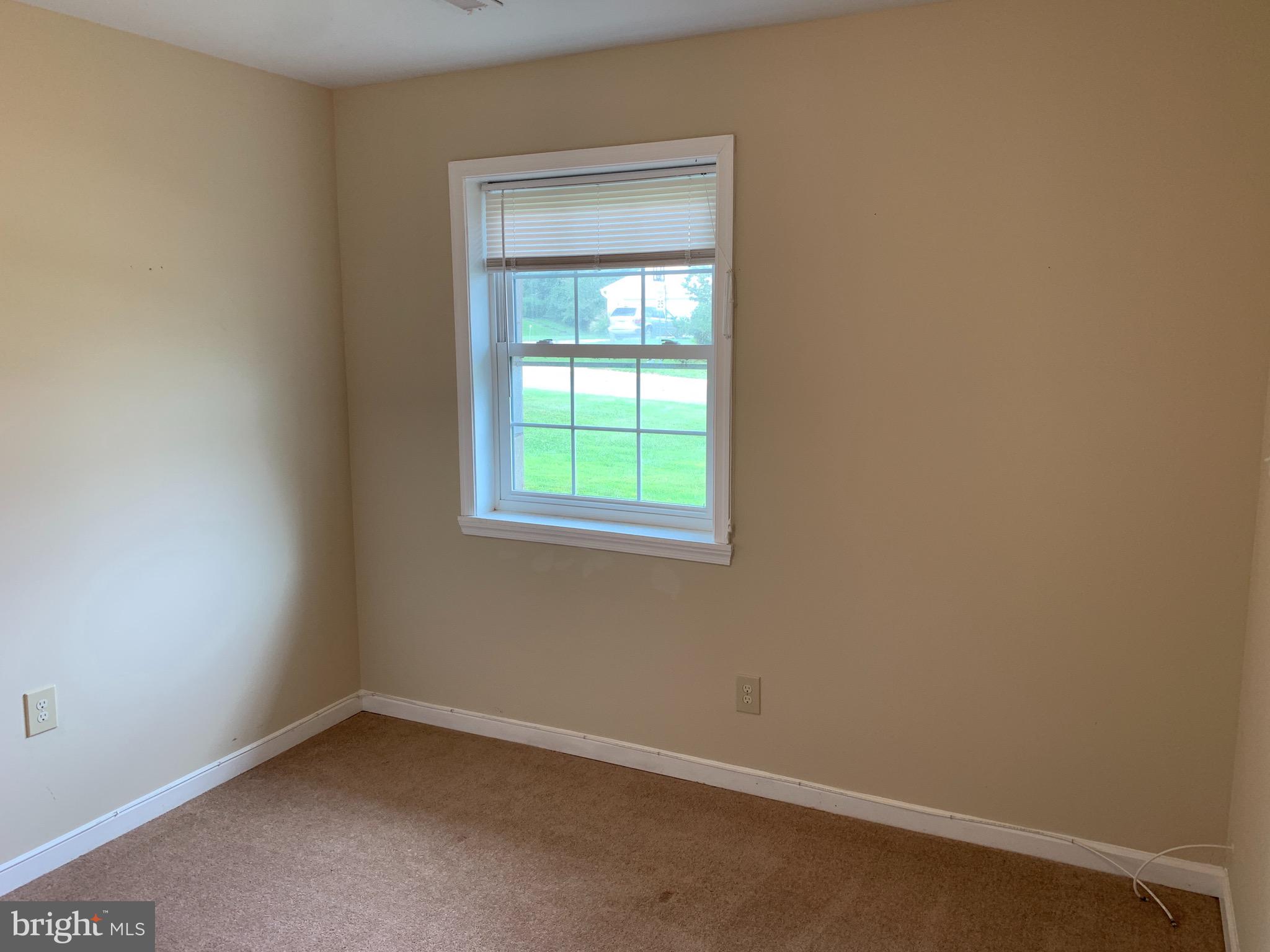 9700 Brookford Road Potomac, MD 20854 - Photo 26 of 27 an empty room with a window