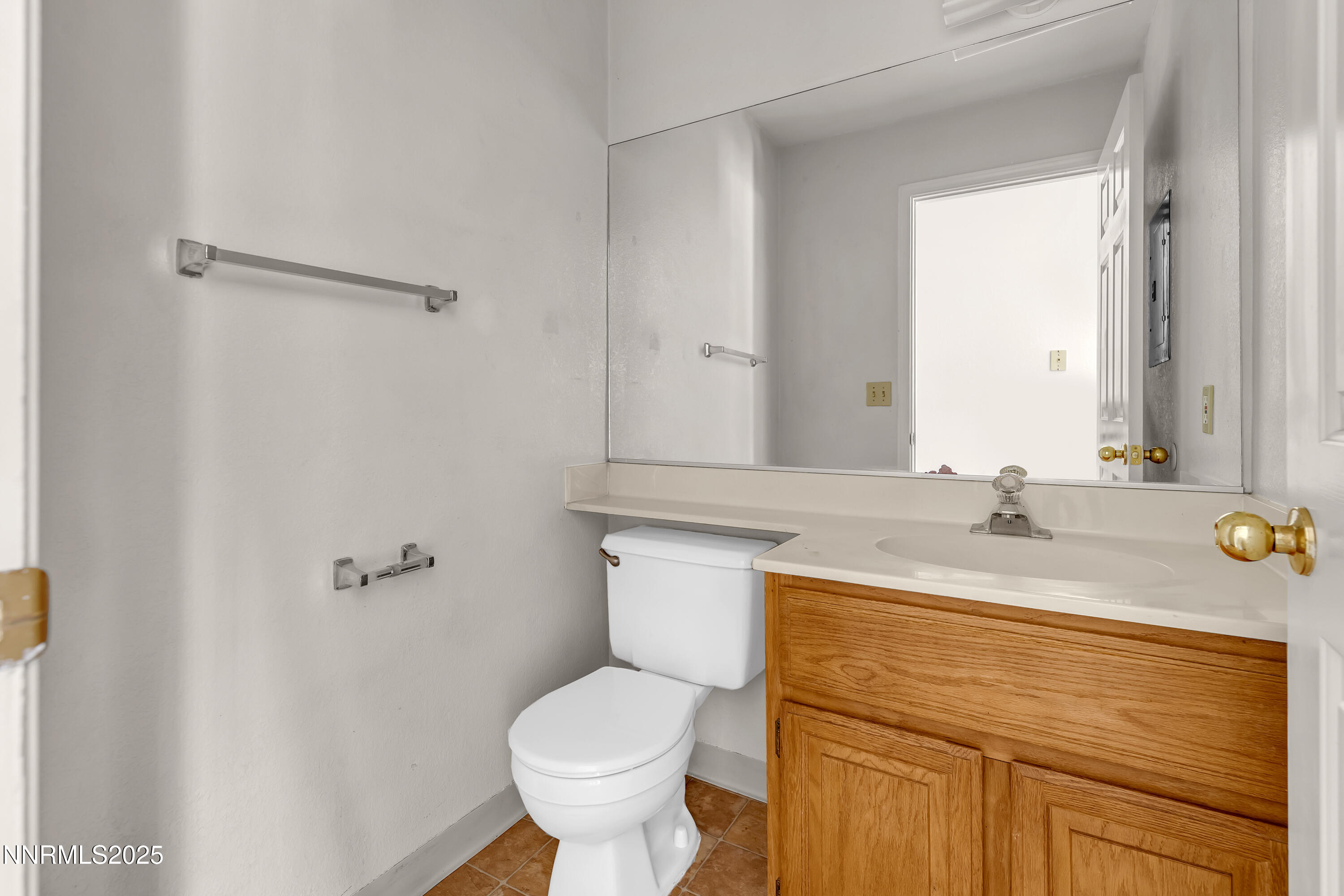 2650 Plumas Street, Unit 11 Reno, NV 89509 - Photo 14 of 33 a bathroom with a sink toilet and mirror
