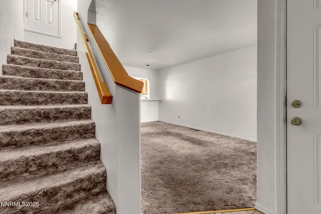 a view of an empty room with window