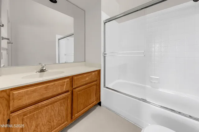 a view of empty room with windows