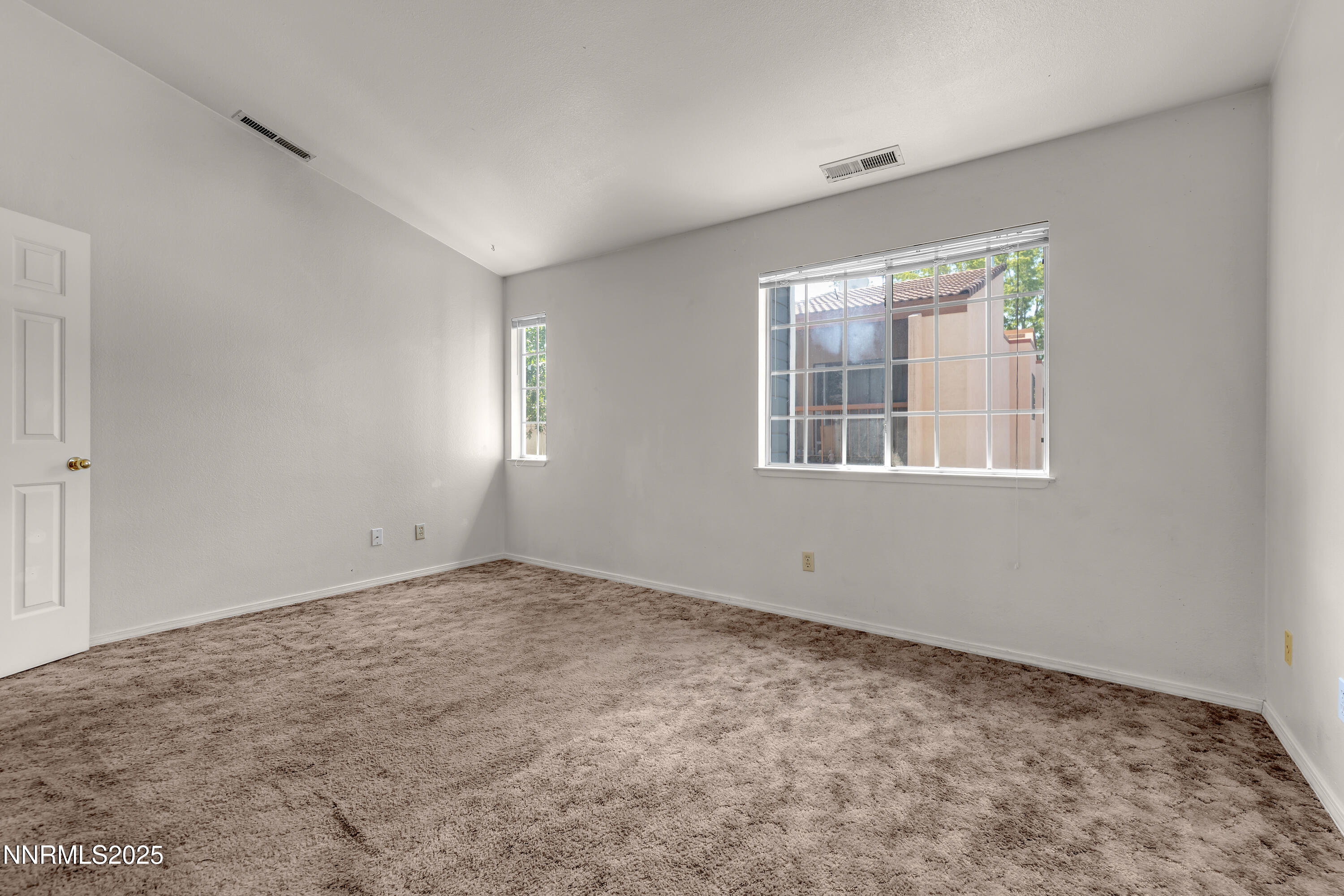 2650 Plumas Street, Unit 11 Reno, NV 89509 - Photo 25 of 33 a view of an empty room with a window