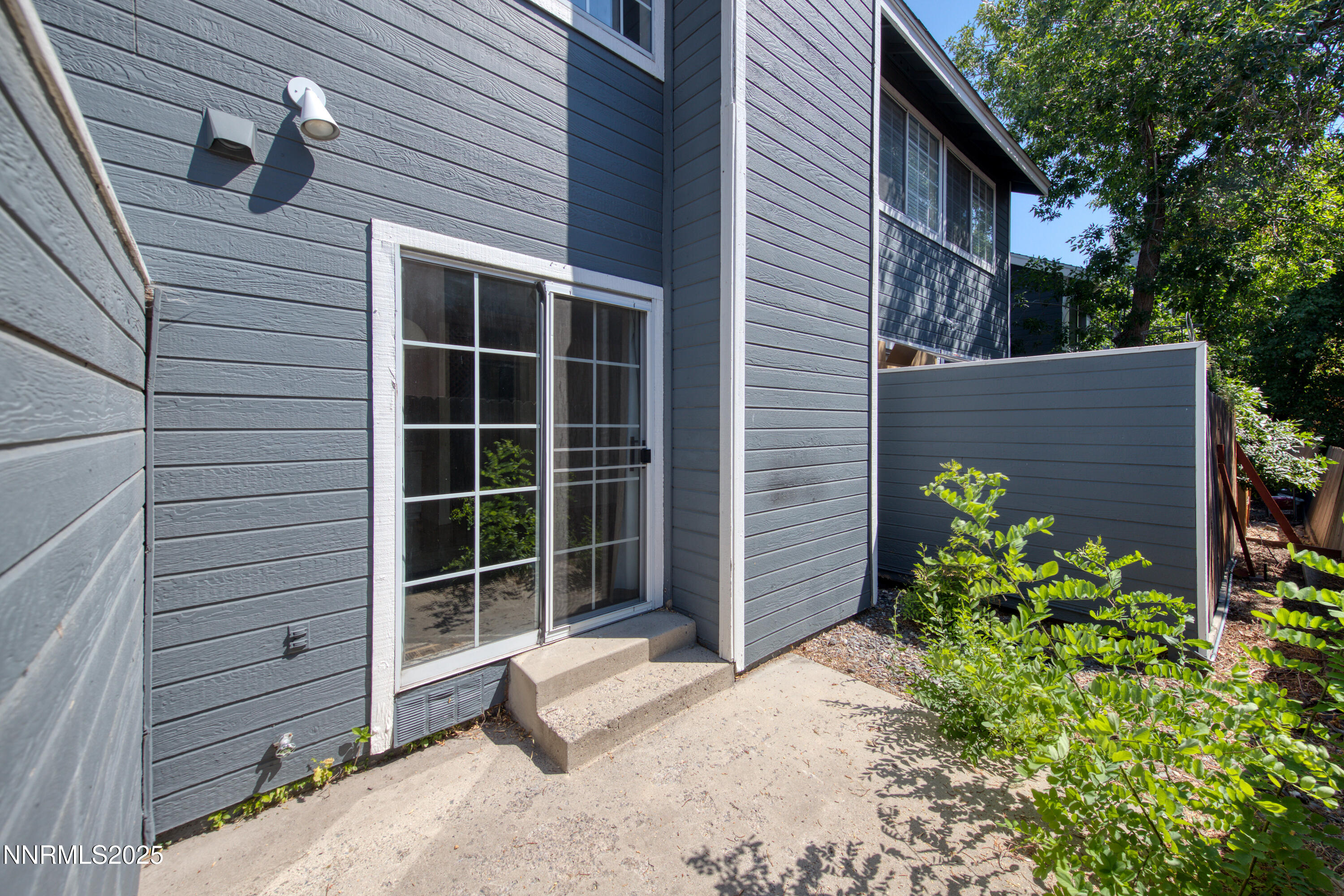 2650 Plumas Street, Unit 11 Reno, NV 89509 - Photo 29 of 33 a front view of a house with a garden