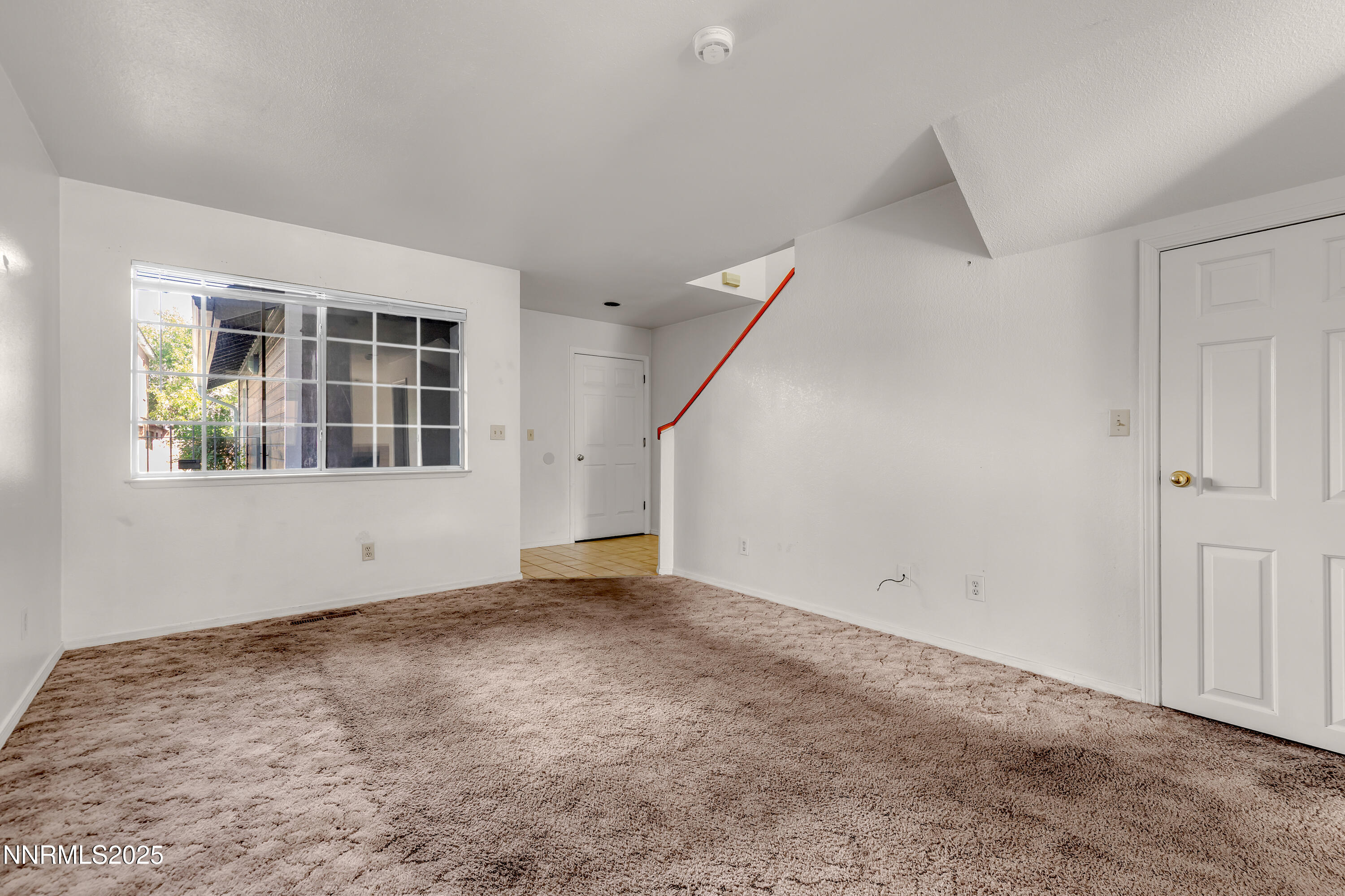 2650 Plumas Street, Unit 11 Reno, NV 89509 - Photo 3 of 33 an empty room with windows