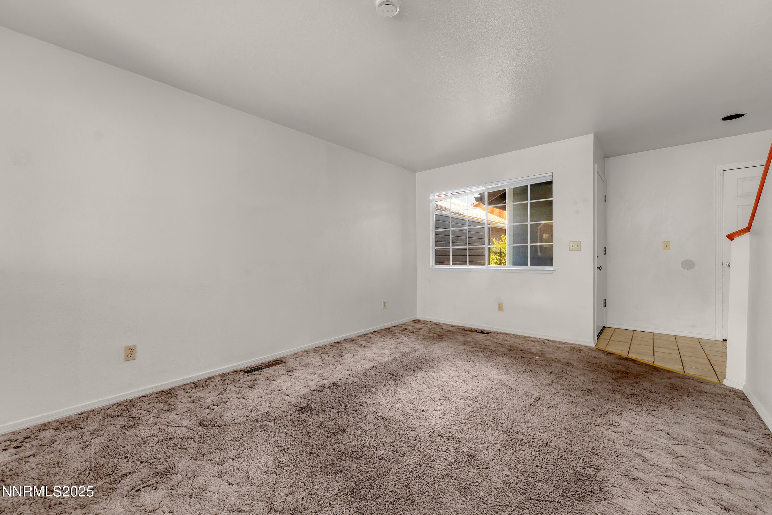 2650 Plumas Street, Unit 11 Reno, NV 89509 - Photo 4 of 33 an empty room with a window
